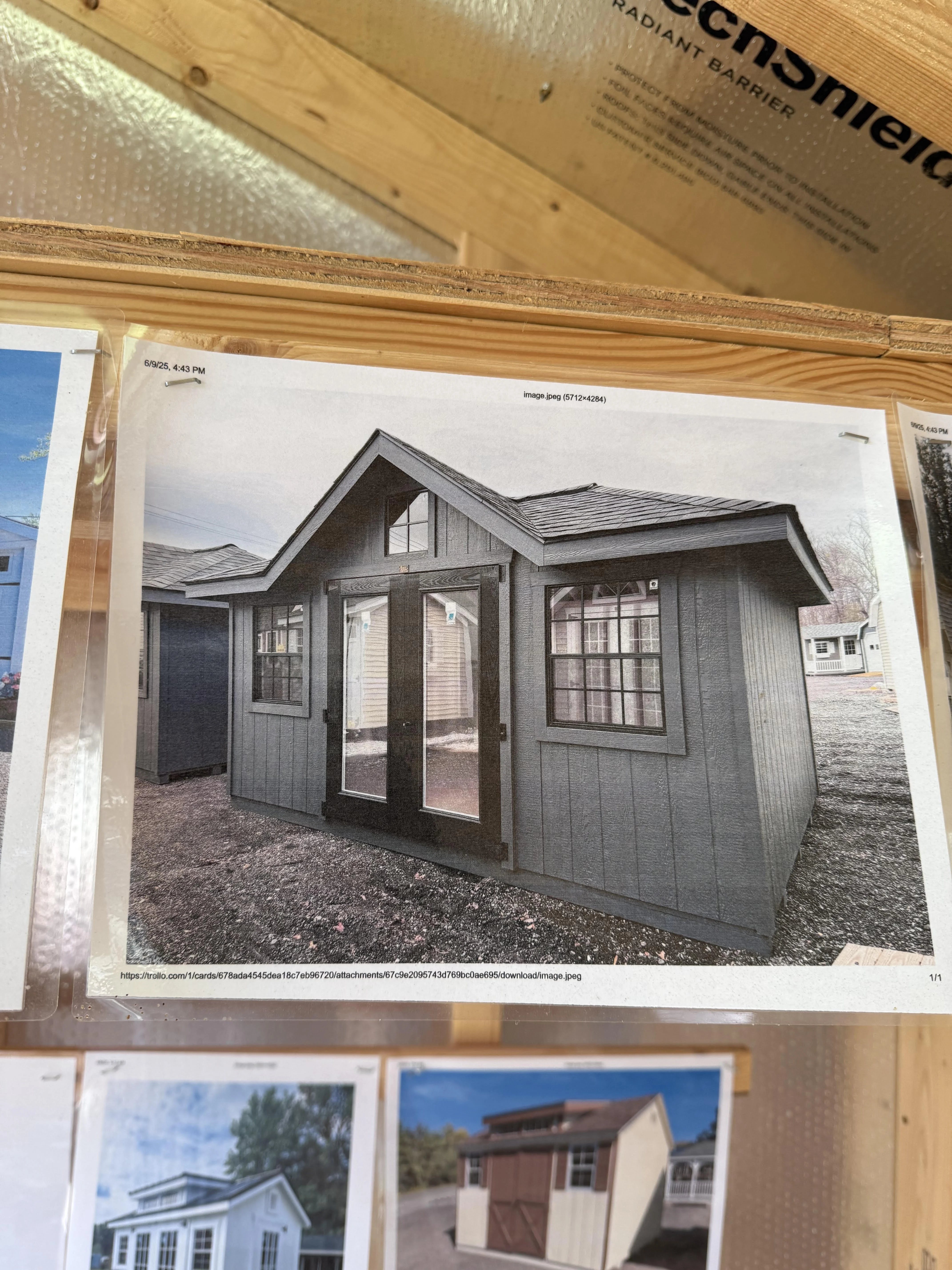 Customer photograph of the dark shed roof used as the original design reference